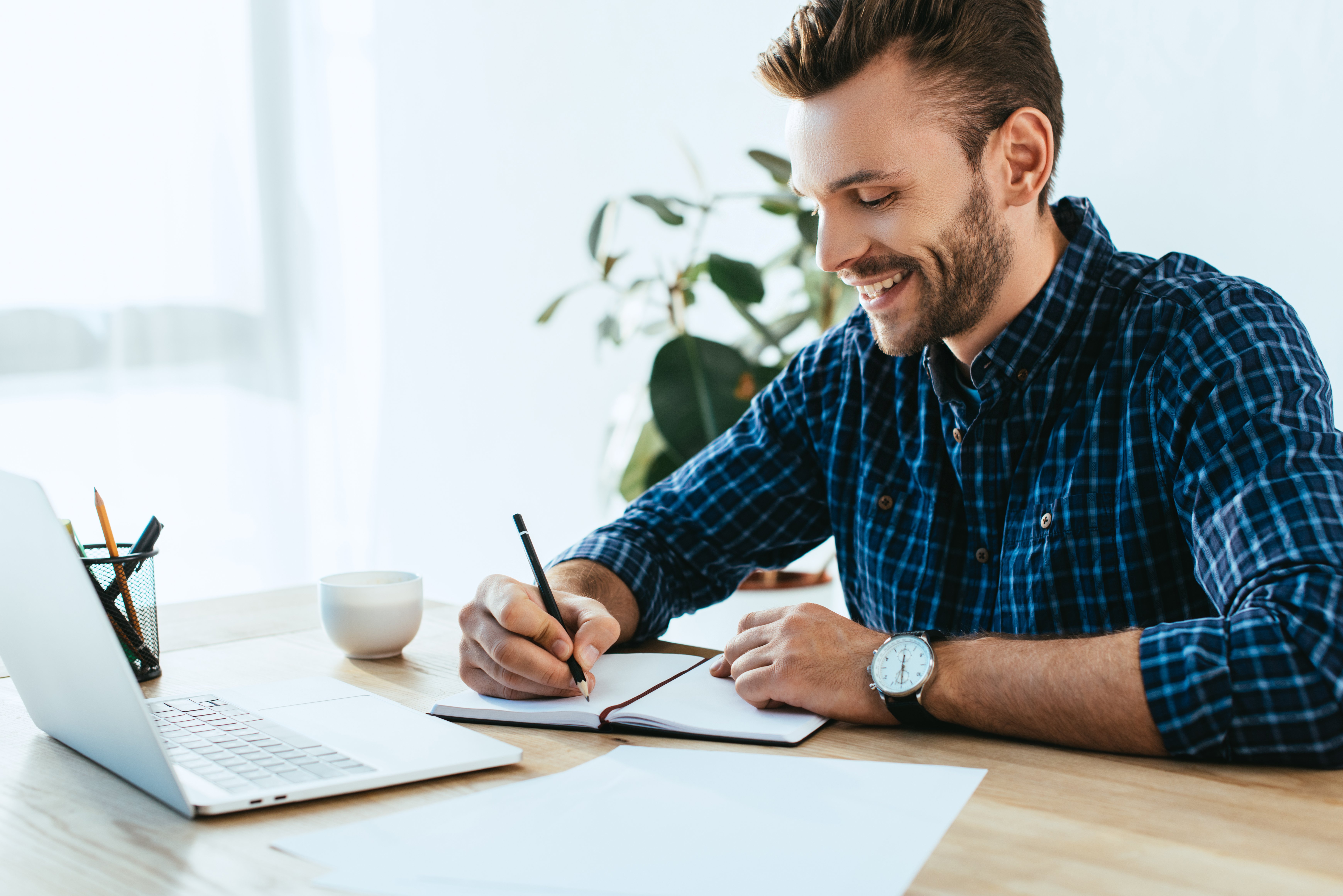 smiling-businessman-taking-part-in-webinar-at-tabl-2021-08-29-22-35-57-utc